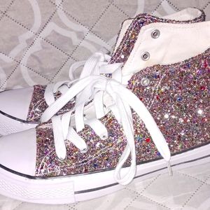 Double platinum performance wear glitter High top shoes.  Size 7.5